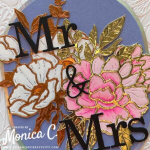 Details of a wedding card made using the Spellbinders Peony Celebration die
