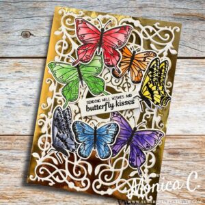 Spellbinders Timeless Collection in gold and white.