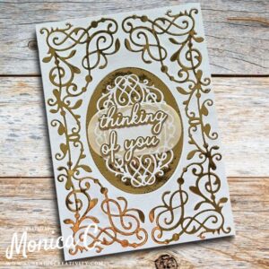 Spellbinders Timeless Collection in white and gold.