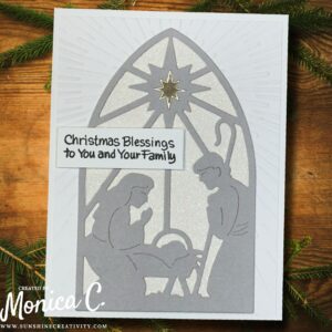 Spellbinders Season of Wonder nativity scene with glitter paper background.