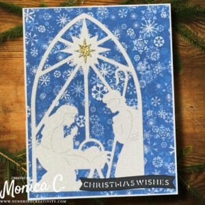 Spellbinders Season of Wonder nativity scene with glitter paper focal image on a patterened paper background