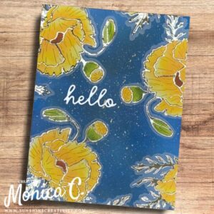 A blue and yellow card made with the die set with Spellbinders Yana's Poppies.