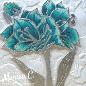 A close up of the teal Amaryllis card