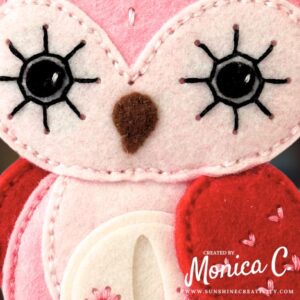 A close up of the girly owl from the Spellbinders Felt Stitch & Create collection