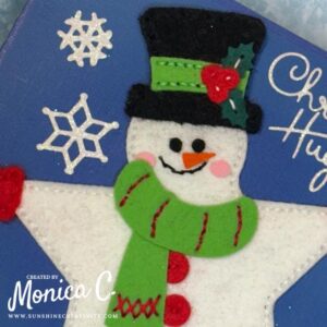 Close up of the sweet Spellbinders Felt Stitch & Create Snowman Star