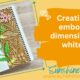Using the Field Notes embossing folder with white ink.
