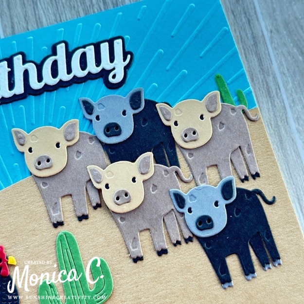 A close up of the pigs from the Spellbinders On the Farm collection